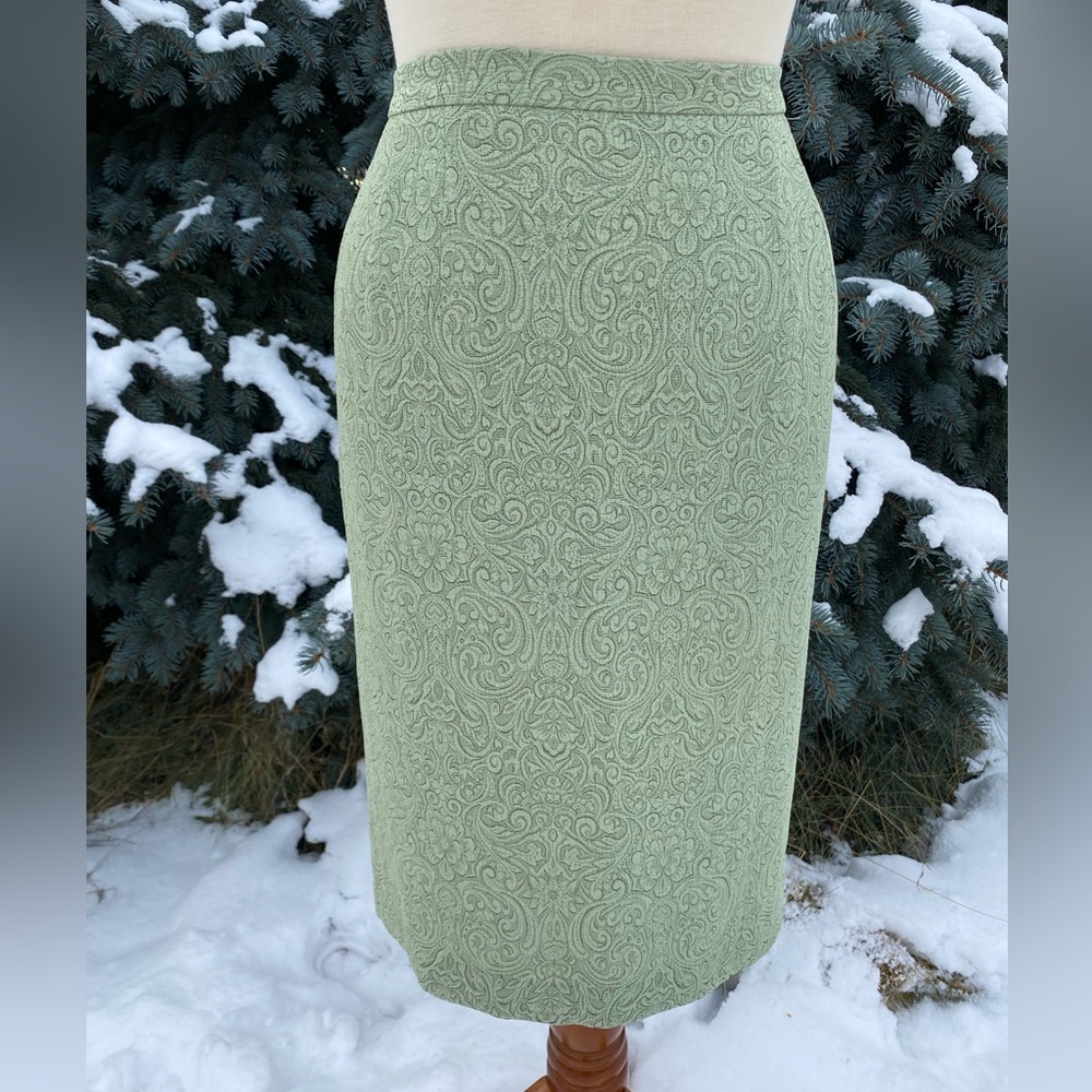 Vintage muted earthy green skirt, zipper in back and partially elastic waist.